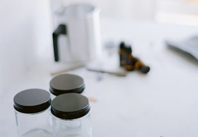 Fragrance oils and empty vessels on the pouring bench